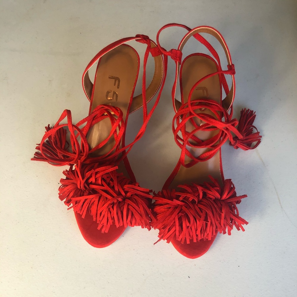 Red suede women’s heels size 9.5